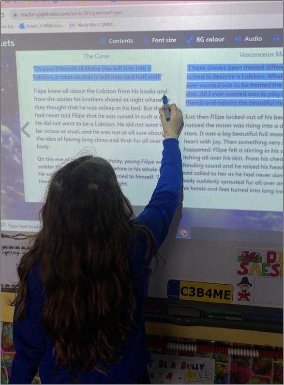 Pontnewydd pupil interacting with whiteboard using Giglets